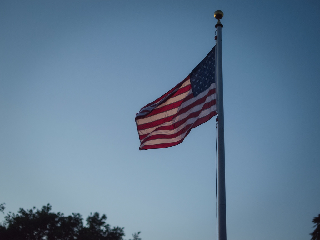 Flagpole at dusk — solar flag pole lighting